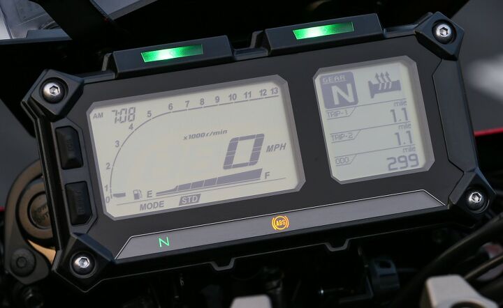 2015 yamaha fj 09 first ride review, Mmm heated grips Worth the price every time The instrument cluster is reminiscent of the FJR The top button on the left turns off the traction control