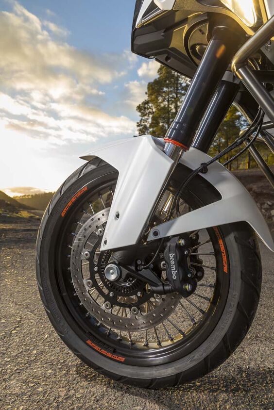 2015 ktm 1290 super adventure first ride review, The WP semi active fork with its anti dive function maintains composure when subjected to extreme braking forces never exhibiting the mushy squirminess associated with longer travel suspension which on the Super Adventure is 7 9 inches front and rear