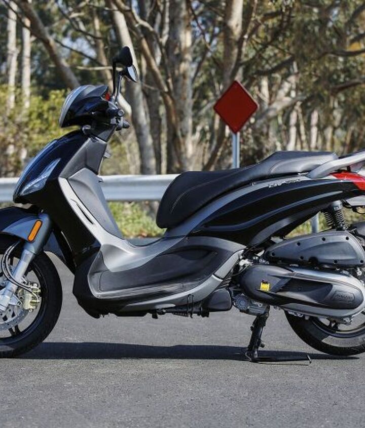 2015 piaggio bv350 i e review, Our BV350 tester came from Piaggio with the NYPD setup that didn t include the windscreen as usually delivered standard For 2015 BV350s are available in Nero Carbonio matte black and Bianco Stella