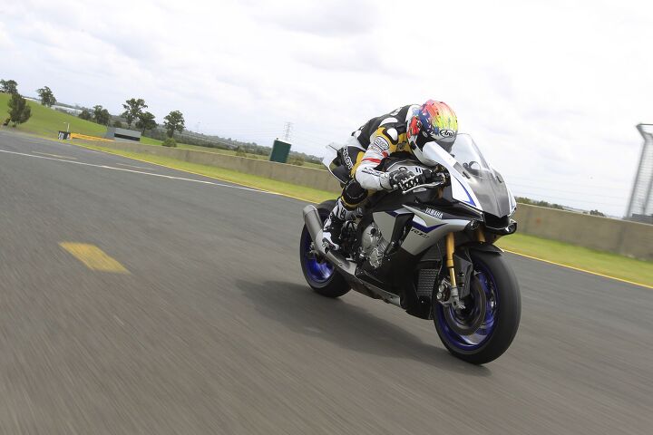 2015 yamaha yzf r1 yzf r1m first ride review video, Aerodynamics especially in a tuck was a big priority for the design team Even at triple digit speeds the R1 and R1M have nice cocoons of still air for the rider to tuck into