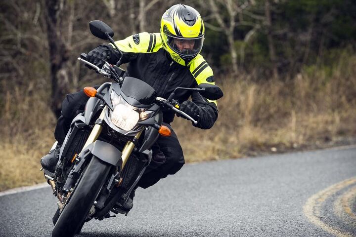2015 suzuki gsx s750 review, This is the extent of lean angle I was willing to risk on our cold rainy ride day Too bad because the GSX S750 seems a willing companion It s heavier than the FZ 09 on the spec sheet but it was impossible to tell if the GSX hides its extra pounds or suffers because of them