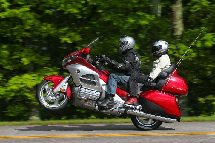 reader s choice best touring motorcycle of 2015 honda gold wing, The Wing s silky six cylinder motor cranks out a pavement wrinkling 105 lb ft of torque enabling quick passing maneuvers when desired