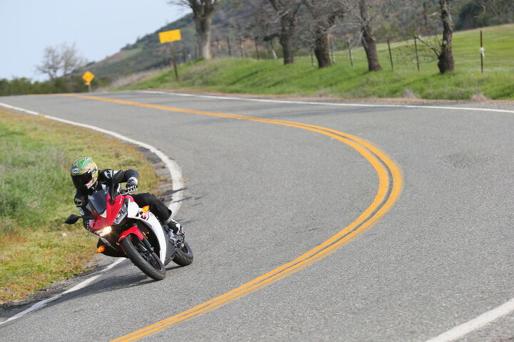 2015 yamaha yzf r3 first ride review video, Seating position is comfy on the R3 Bars are high and the pegs low