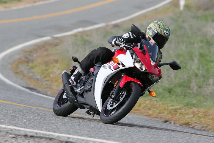 2015 yamaha yzf r3 first ride review video, Yamaha calls the R3 s styling concept R DNA and includes a mass forward silhouette up cutting tail section twin headlights and R6 inspired aerodynamic design