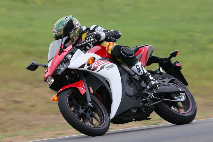 2015 yamaha yzf r3 first ride review video, From big to small an R series Yamaha has to be able to hold its own on a racetrack The R3 succeeds in that mission