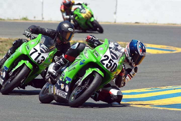 skidmarks slow bikes fast, Todd Grice 250 and Bobbie Wetterau showing expert form as they battle for 7th place Sonoma Raceway 2011 Wetterau s best lap time was just 0 6 second ahead of Grice s Photo by Gary Rather