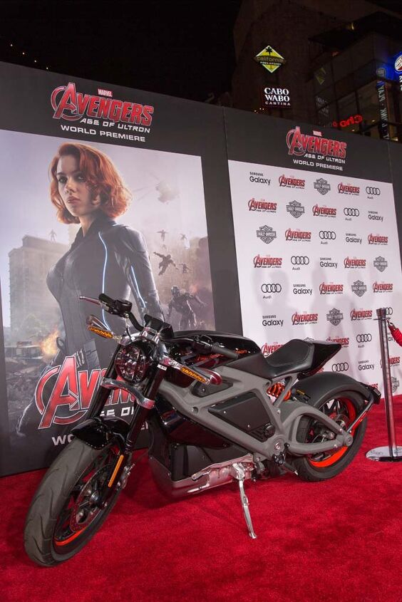 harley davidson takes a ride with the avengers, The Harley Davidson LiveWire electric motorcycle hangs out on the red carpet that blanketed Hollywood Boulevard during the premiere of Avengers Age of Ultron In the film the Live Wire makes a dramatic appearance by leaping out of Iron Man s Quinjet attack aircraft