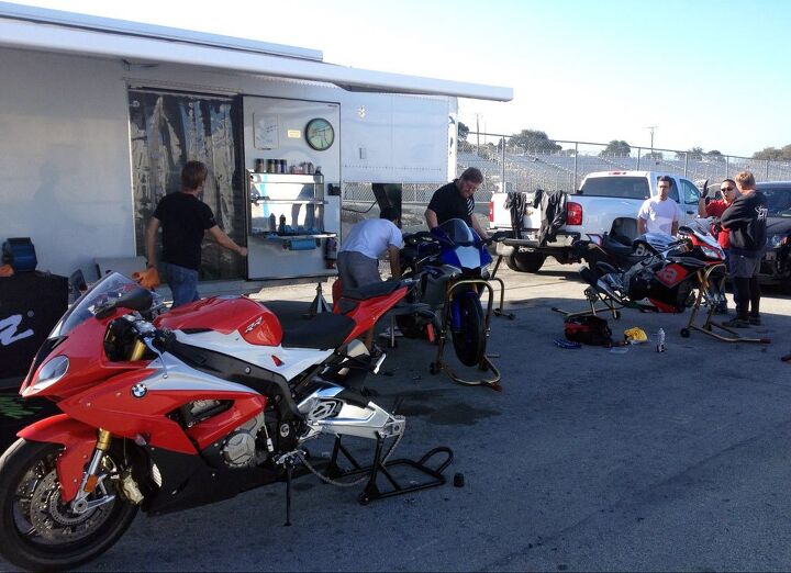 whatever too much fun, The MO crew swings into action Also the Kawasaki crew Joey Lombardo hiding and the Aprilia crew Shane Pacillo and Alex Frantz behind their bike Honda sent Rick Zwart in a downsized race transporter Sprinter van with a spare CBR