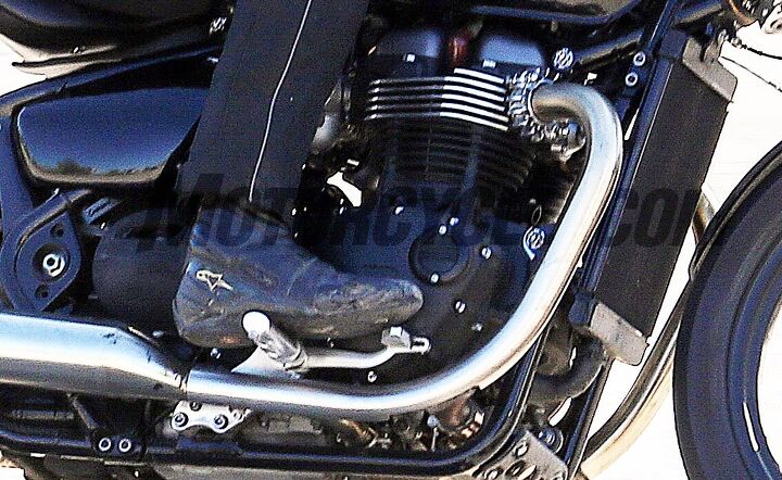 spy shots triumph s liquid cooled engine in a bobber prototype, While this is the best shot we ve seen of Triumph s new liquid cooled engine we still can t be certain what the new displacement will be