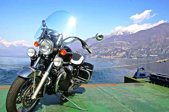 photographing motorcycles parked in front of places, Say you re waiting for the ferry at Lecco ready to float the Guzzi up to Bellagio and ride down to Como Then along the western edge of the lake a young lady compliments you on the bike Her name is Gina and she s fascinated to know that you re related to George Clooney Another story