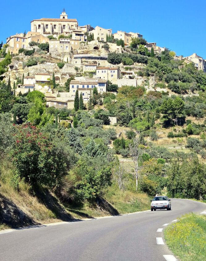 riding motorcycles in france how the french roll, And their peaks are often occupied by clustered villages like Les Baux de Provence originally the site of a second century Celtic fort