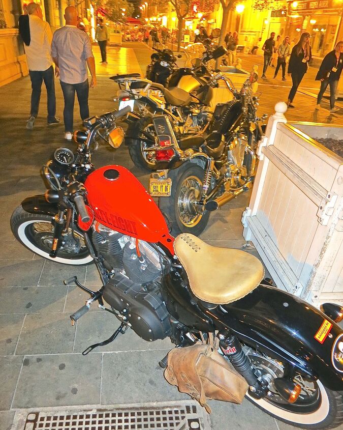 riding motorcycles in france how the french roll, A new Harley Forty Eight parked within the owner s sight at a sidewalk cafe