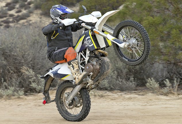 2016 husqvarna 701 enduro review, Prodigious low end torque and a broad yet friendly pull make the 701 Enduro a blast to ride Lofting the front end is fun and easy on the Husky which is purported to weigh 319 pounds with its fuel tank empty