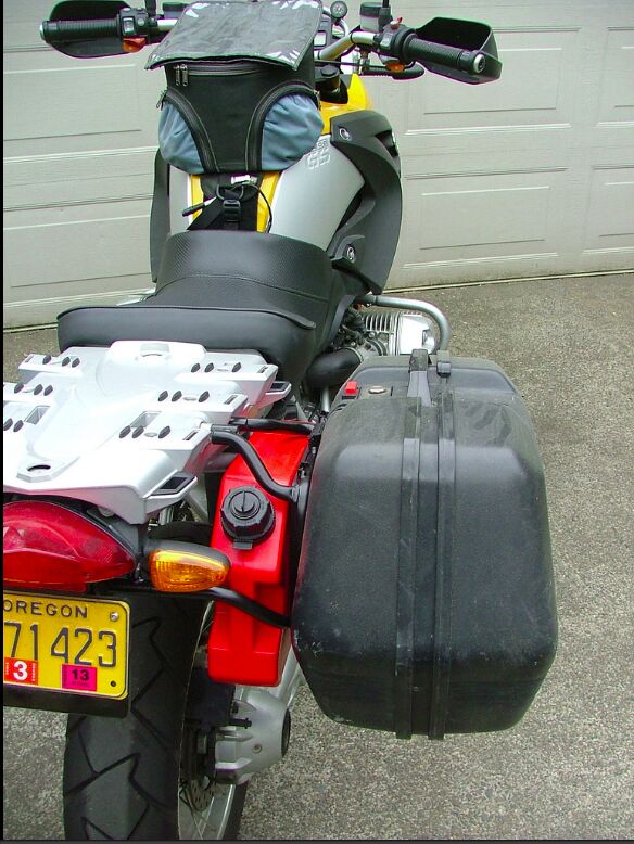 how do i carry extra fuel on my motorcycle, The Rotopax fuel cell fits nicely behind this luggage