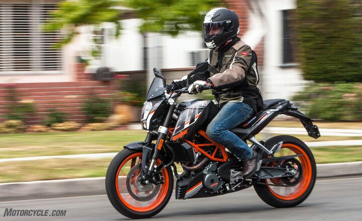 2016 ktm 390 duke long term review, Few would guess this attractive street machine retails for less than 5 000 The windscreen seen in this photo is from KTM s PowerParts division which replaced the teeny little stock deflector to provide a modicum of wind protection for 40