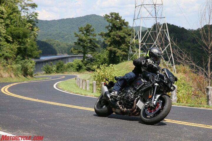 2017 yamaha fz 10 first ride review, Smooth pavement like this is hardly a test for the KYB suspension on the FZ though rougher patches were simply absorbed by the fork and shock while allowing the bike to continue on its path The fork s preload compression and rebound adjustments are all available at the top of the fork tube