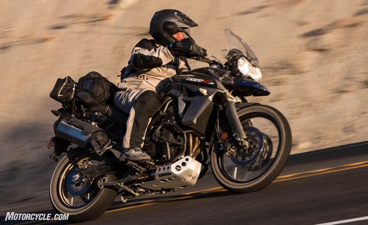 2016 triumph tiger 800 xcx review, The x model s electronics package centerstand skid plate and crash bars are a sensible and affordable upgrade over the standard model Tiger XC If you do any off roading the extra protection can turn a potentially ride ending error into a minor mishap