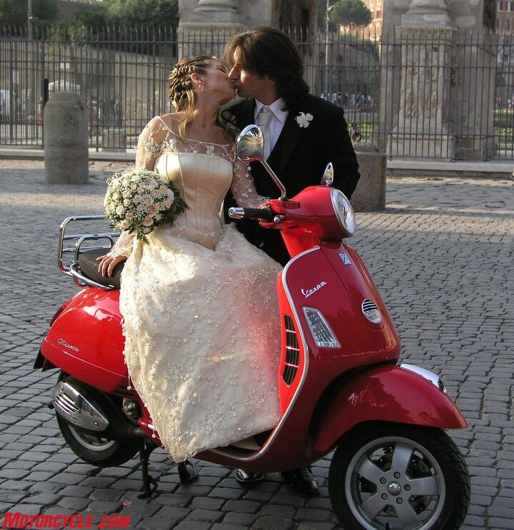 church of mo roaming holiday touring tuscany on a 2006 vespa gts250ie, Newlyweds Leonardo Cirella and Maria Rosaria Stoccioli wanted to pose for wedding pictures with our scooter so who were we to say no MO wishes them a long and happy marriage