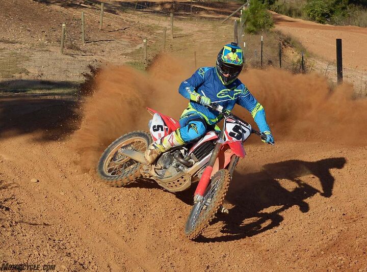 2017 honda crf450r first ride review, The CRF s new engine packs an arm jerking pro level hit in its most aggressive ECU map setting Honda s Engine Mode Select system offers two alternate maps to mute the power as needed