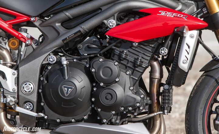 2016 triumph speed triple r review, Know the R by the TTX36 hlins shock peeking out from behind one of the tastiest Triples of all time also by that red subframe c f front fender excuse me mudguard and other tidbits