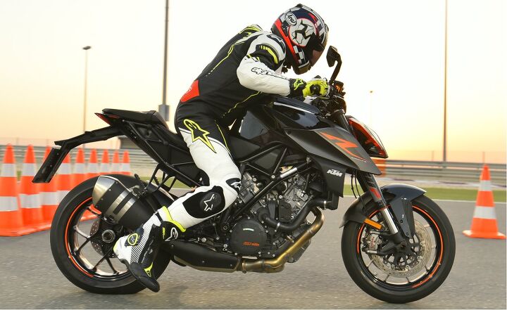 2017 ktm 1290 super duke r first ride review, Engage Launch Control Hold the throttle wide open release clutch carefully keep the throttle pinned or the system disengages It takes a while to force yourself not to roll out of the throttle when the front end starts lifting