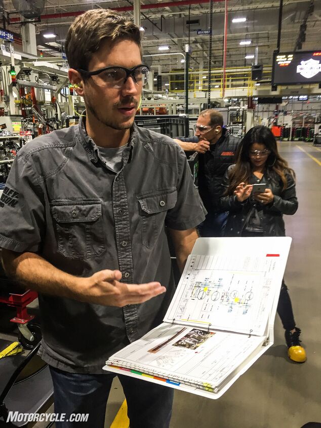 touring harley davidson s pilgrim road powertrain operations plant, Manager of Engineering Manufacturing Jared Olsen explains the importance of the Job Instruction Manual This book contains the annotated assembly instructions jointly developed during the Milwaukee Eight s design by the engineers and the assembly line employees