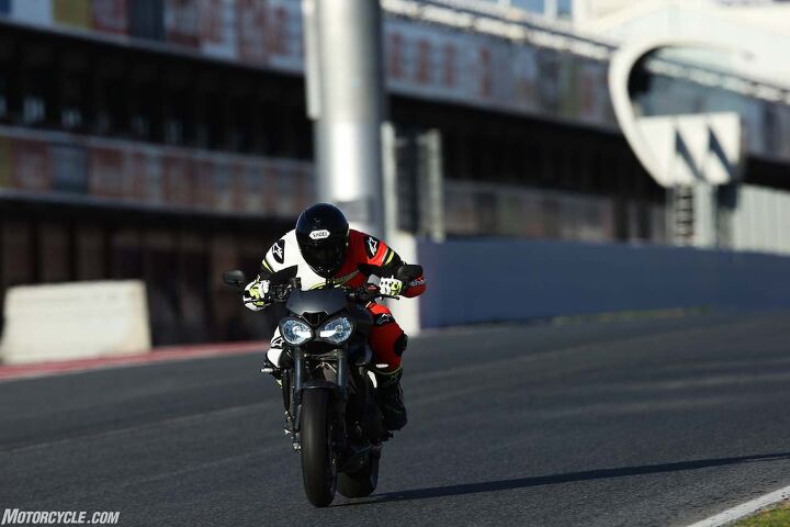 2017 triumph street triple rs review first ride, The 2017 Street Triple RS topped out at 149 mph down Catalunya s front straight Never once did the fairingless naked wobble or give any hint of instability at the track Pirelli Diablo Supercorsa SP tires stock on the RS certainly helped Footpegs were occasionally grinding away but not enough to hinder the bike as a damn fun trackday toy