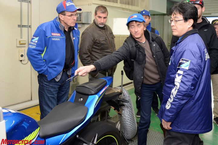 inside suzuki factory tour part 1, Here I point at a sticker on the GSX R1000 s fuel tank displaying E10 presumably for a 10 ethanol blend When I asked if this meant this particular bike is bound for the U S market where ethanol laced fuel is commonplace I was surprised to learn that Europe is now also using ethanol blends in some of its fuel