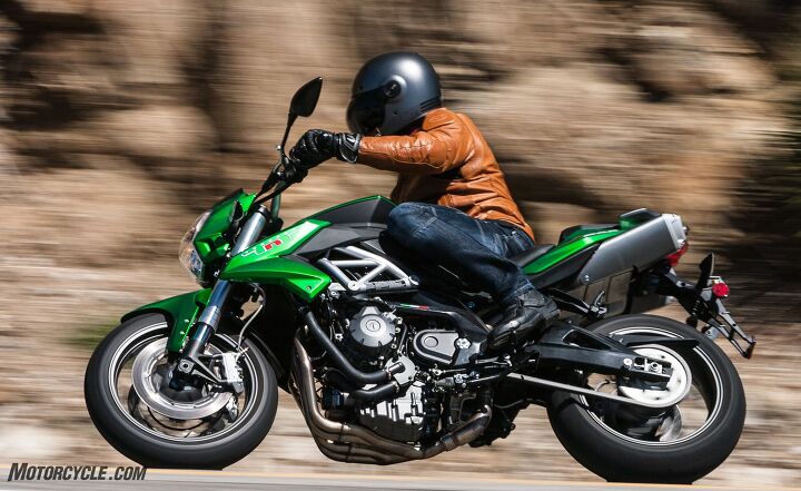 2017 benelli tnt600 tornado review, The TnT holds its line well as it should with a 58 3 inch wheelbase which is significantly longer than other models in this segment There seems to be an extra amount of roll in the twistgrip before reaching the throttle stop