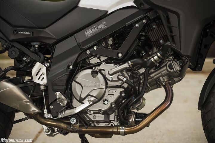 2017 suzuki v strom 650 and 650xt first ride review, Still with possibly the easiest access oil filter in all of motorcycling SV650 cams and things give it even more power as well as Euro4 cleanliness Dual catalyzers live in the muffler