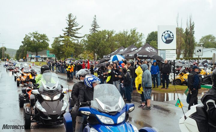 can am spyder 10th anniversary homecoming, Spyder riders are a hardy bunch Neither the rain nor chilly weather could keep the smiles from their faces during the Homecoming s opening parade