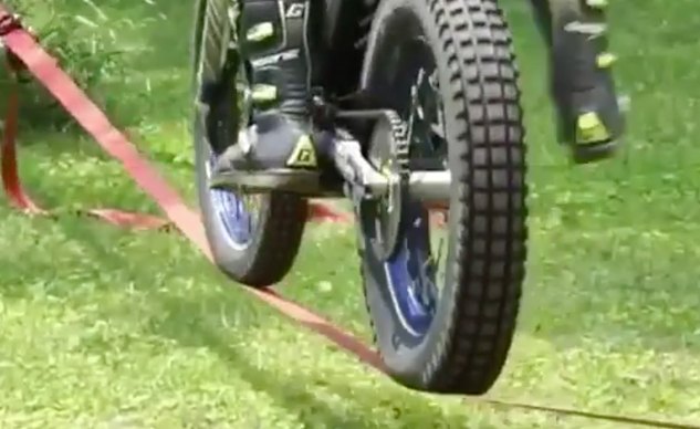 This Guy Uses a Ratchet Strap as a Motorcycle Tightrope