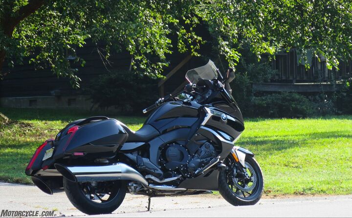 2018 bmw k1600b first ride review, The rear end is about 2 8 inches lower than the other Ks but we only lost 10mm wheel travel front and rear compared to the GT and GTL The new bags hold 37 liters each