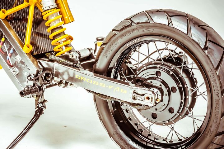 exodyne electric motorcycle, The in hub motor may look like a drum brake but in fact does the exact opposite