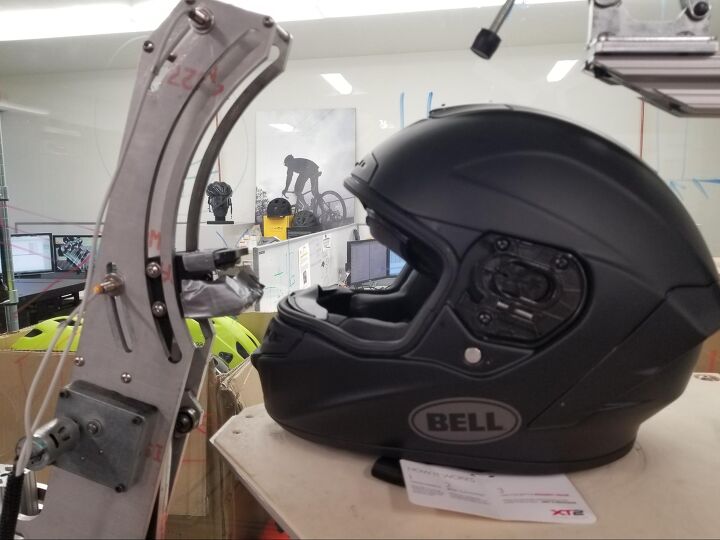 bell helmets dome r d lab tour, This rig is to test the durability of faceshield mechanisms opening and closing a visor some 50 000 times Helmets are also tested in ovens and freezers from temperatures ranging from 122F deg to 4 as well as in water tanks