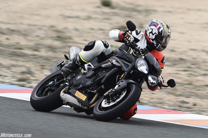 2018 triumph speed triple rs first ride review, Our one session around a damp Almeria circuit provided me the opportunity to twice spin up the rear wheel and send it sliding out of alignment exiting corners and that was with the bike in Road mode Thankfully I can report that traction control did its job and kept me from hitting the deck