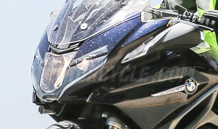 bmw r1200rt with new boxer engine spied, The headlights are slimmer than the lights on the current R1200RT The 2018 model has panels on the windscreen covering the mounting points it s hard to tell if the new model will go without them or if they were just removed during testing