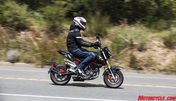 2018 benelli tnt135 first ride review, I m not a very big guy but the TnT135 makes me look massive Still the seating position is rather comfortable for a bike this small