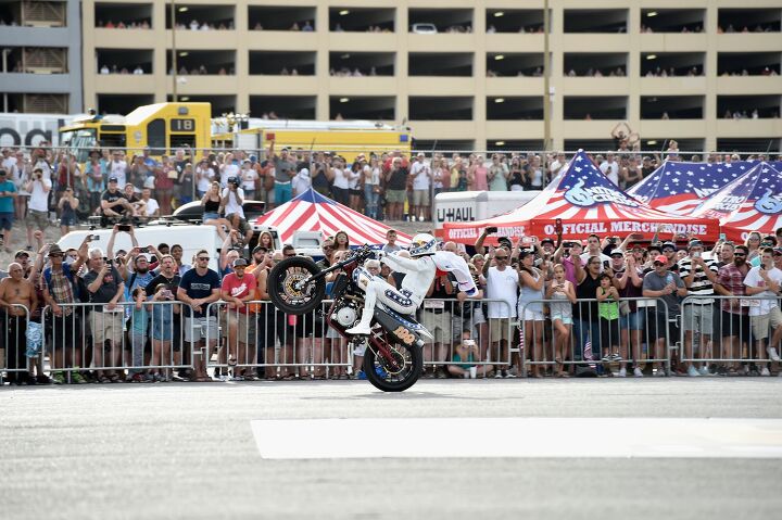travis pastrana pays homage to evel knievel and soars his way into the record books, The city was mobbed with people trying to get a view of the spectacle The people in the parking garage behind had a great one
