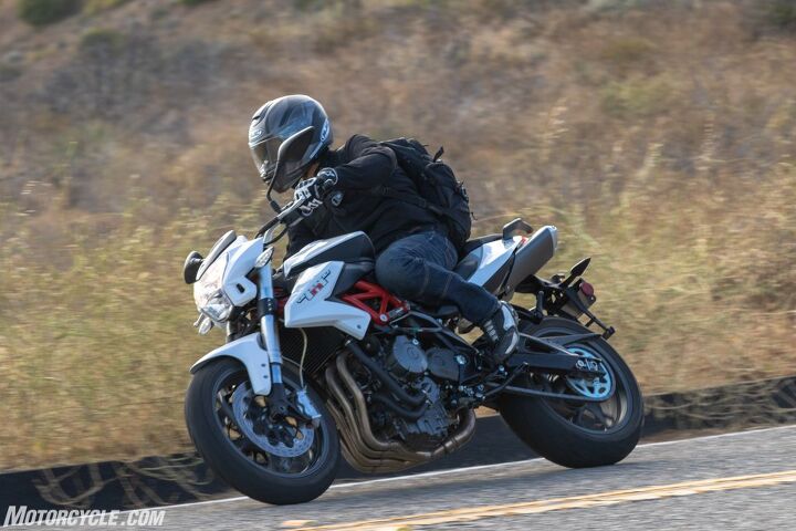 the benelli tnt300 and tnt600 might be the best bikes coming out of china today, The TnT600 s four header pipes are hard to miss at this angle What s a little odd is seeing them route up and back towards an undertail exhaust To quote my teenage niece That s so 12 years ago