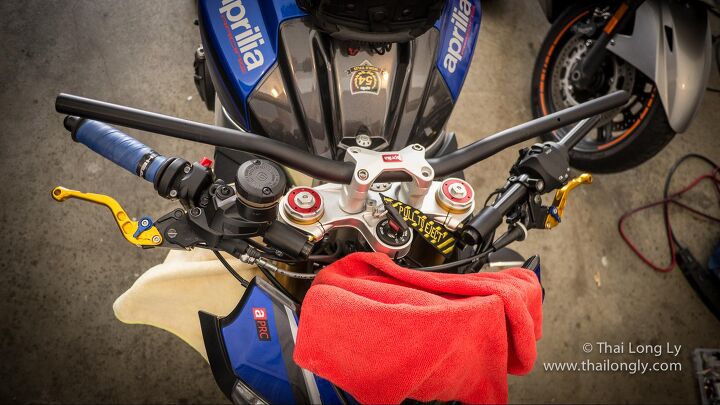 an owner s perspective aprilia tuono upgrades pt 2, Lower and leaner as in you ll be leaning over lower with riser clip ons from Woodcraft