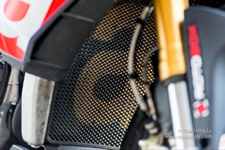 an owner s perspective aprilia tuono upgrades pt 2, Mandlebar Racing radiator oil cooler covers are cheap insurance against expensive repairs