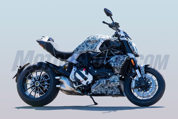 2019 ducati diavel spy photos, Pictured here is the standard Diavel model while the other shots depict an S version with a gold colored hlins fork and Brembo M50 calipers The right air scoop is missing exposing more of the trellis frame inherited from the XDiavel