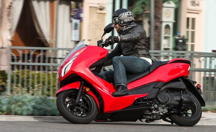 scooter versus motorcycle pros and cons, 2015 Honda Forza at Isle of Man Okay it s downtown Long Beach