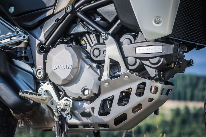 2019 ducati multistrada 1260 enduro review first ride, There are a couple of cool features in this photo that one might not notice at a quick glance First off the 1260 Enduro comes with a center stand as stock a must for any off road riding maintenance and or repair The brake pedal can be adjusted for street in its lower position and off road riding higher position by pulling it out and flipping it over it s spring loaded Additionally the rubber insert on the footpegs is easily removable to give you a full dirt bike style peg with plenty of traction see below