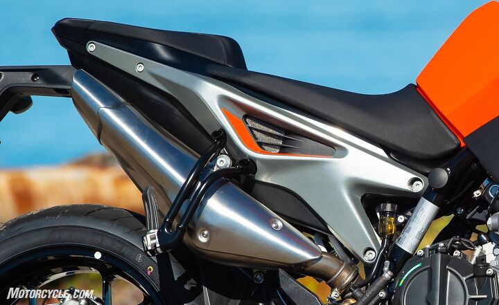 2019 ktm 790 duke review first ride, That triangular hole in the subframe is the airbox intake For me the only stylistic miscue on the bike is the passenger peg which just begs to be removed for a cleaner look and what do you know KTM sells a sporty passenger seat cover