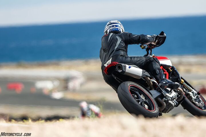 2019 ducati hypermotard 950 950 sp first ride review, Me exiting a corner That Termignoni pipe is optional the SP and base 950 come with the same undertail dual exhaust