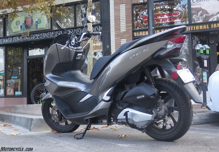 2019 honda pcx150 review, Comes with center and sidestands Our meats are a size larger than before too now at 100 80 14 front and 120 70 14 rear Muy guapo Triple rate rear springs provide a swell ride