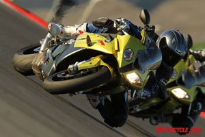 church of mo 2010 bmw s1000rr review, A centrally located ram air duct provides pressurized cold air through the steering head into the airbox