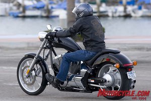 church of mo 2010 honda fury review, A rider sits low behind the gorgeous fuel tank which helps redirect the wind at highway speeds Note the color matched aluminum swingarm that is part of the shaft drive system